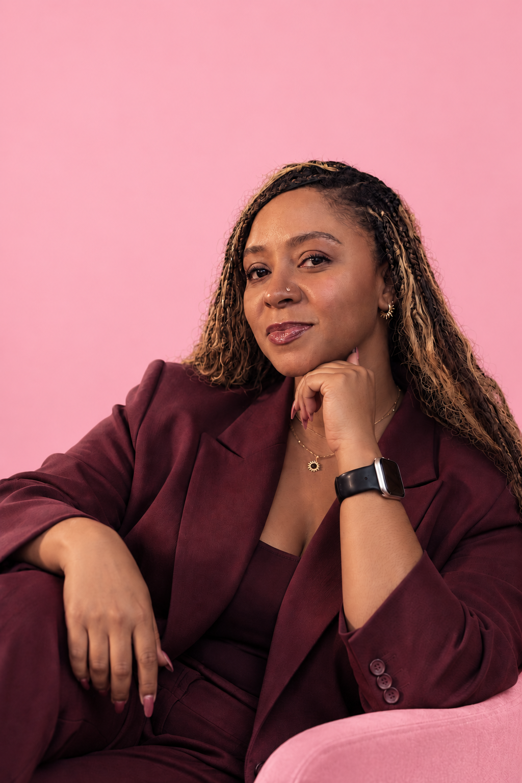 Jaliyah Jasper, founder of JJasper+Co., resting her hand at her chin